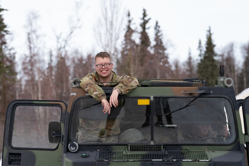 Spc. Dylan Lundquist pauses for a photo during a joint operations field training exercise at Camp Mad Bull.