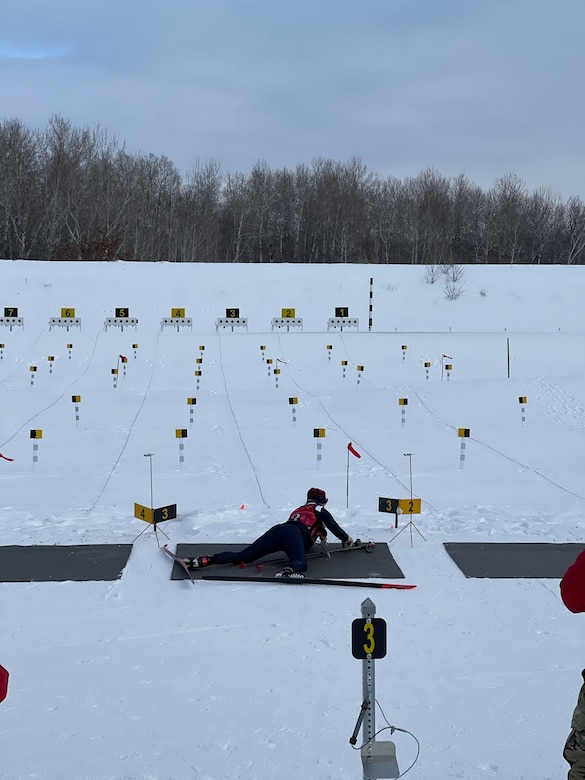 Alaska National Guard Chief Warrant Officer 5 Tracy Dooley shoots at her targets during the Annual Chief of the National Guard Biathlon Race on Camp Ripley, Minnesota, from Feb. 12-15, 2022. The AKNG team took first place overall in the women's division during this year's competition. (Courtesy photo)
