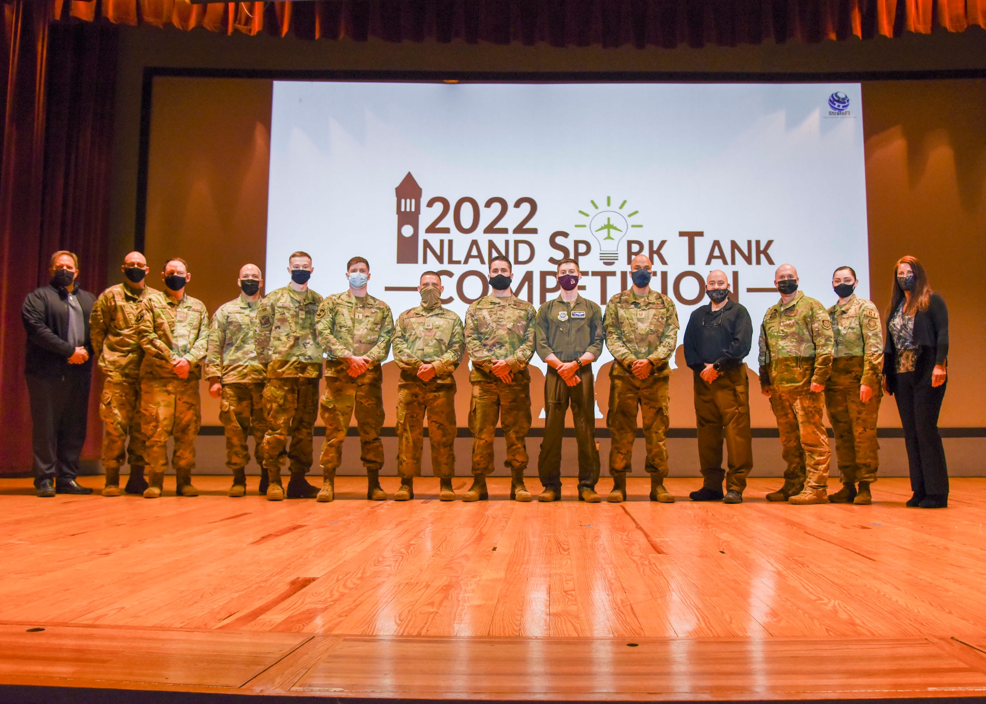Inland Northwest Spark Tank Competition contestants, judges, and hosts pose for a group photo.