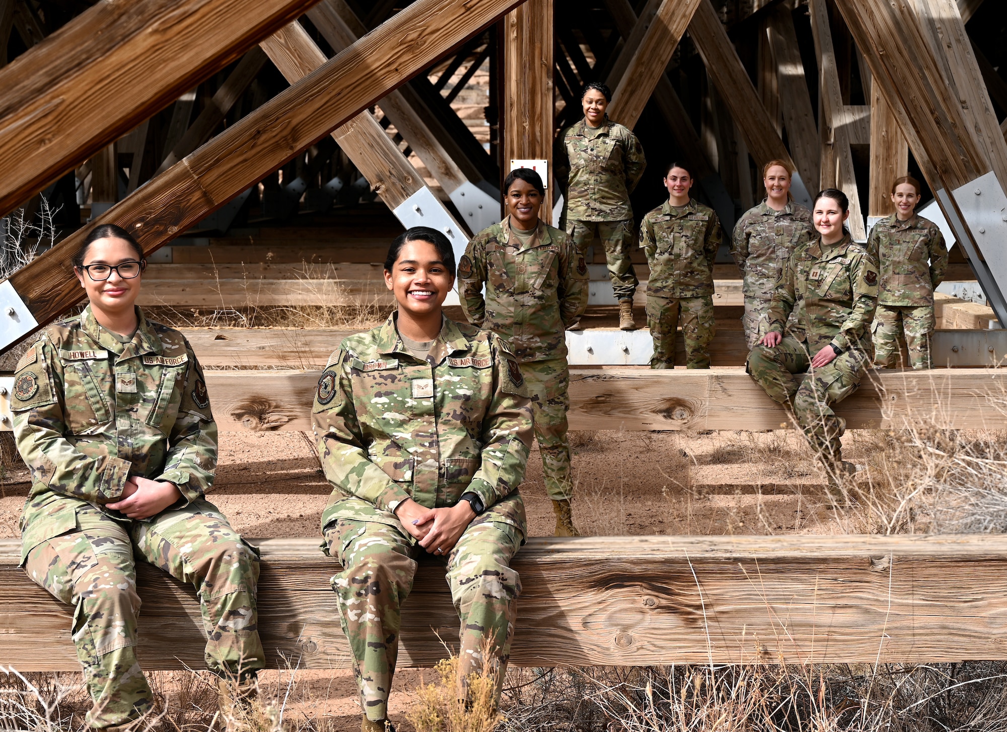 A group of women pose together.