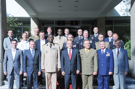 Maj. Gen. Steven Cray, the Vermont delegation, representatives of the Army of the Republic of Macedonia, the Minister of Defense of Macedonia and his senior staff, along with representatives from Senegal pose for a group photo outside the Ministry of Defense in Skopje, Macedonia, Sept. 24, 2014. The likely unit that will be the focus of the tri-lateral engagement is Macedonia's medical unit which has Role 2 capabilities. (U.S. Air National Guard photo by Capt. Dyana Allen)