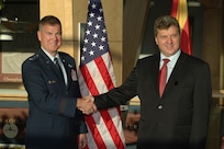 Air Force Maj. Gen. Michael Dubie, adjutant general of the Vermont National Guard, welcomes Macedonian President Dr. Gjorge Ivanov at the Burlington International Airport in Vermont, Sept. 17. The Macedonian president is in Vermont to meet with deploying troops and state officials this weekend. Vermont and Macedonia have been linked by the National Guard State Partnership Program since 1995. (U.S. Air National Guard photo/Senior Airman Jameel Moses)