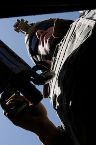 U.S. Army Spc. Robert Dearden, an infantryman from Georges Mills, N.H., of 4th Platoon, D Company, 3rd Battalion, 172nd Infantry Regiment mans a machine gun during a joint patrol with a platoon of Macedonian Rangers, June 5. The Macedonians are embedded with the D Company Soldiers of the Vermont National Guard as part of their state Partnership for Peace Program. They are the first state partnership involved in the program to embed and run combat operations. (U.S. Army National Guard photo/Staff Sgt. Whitney Hughes)