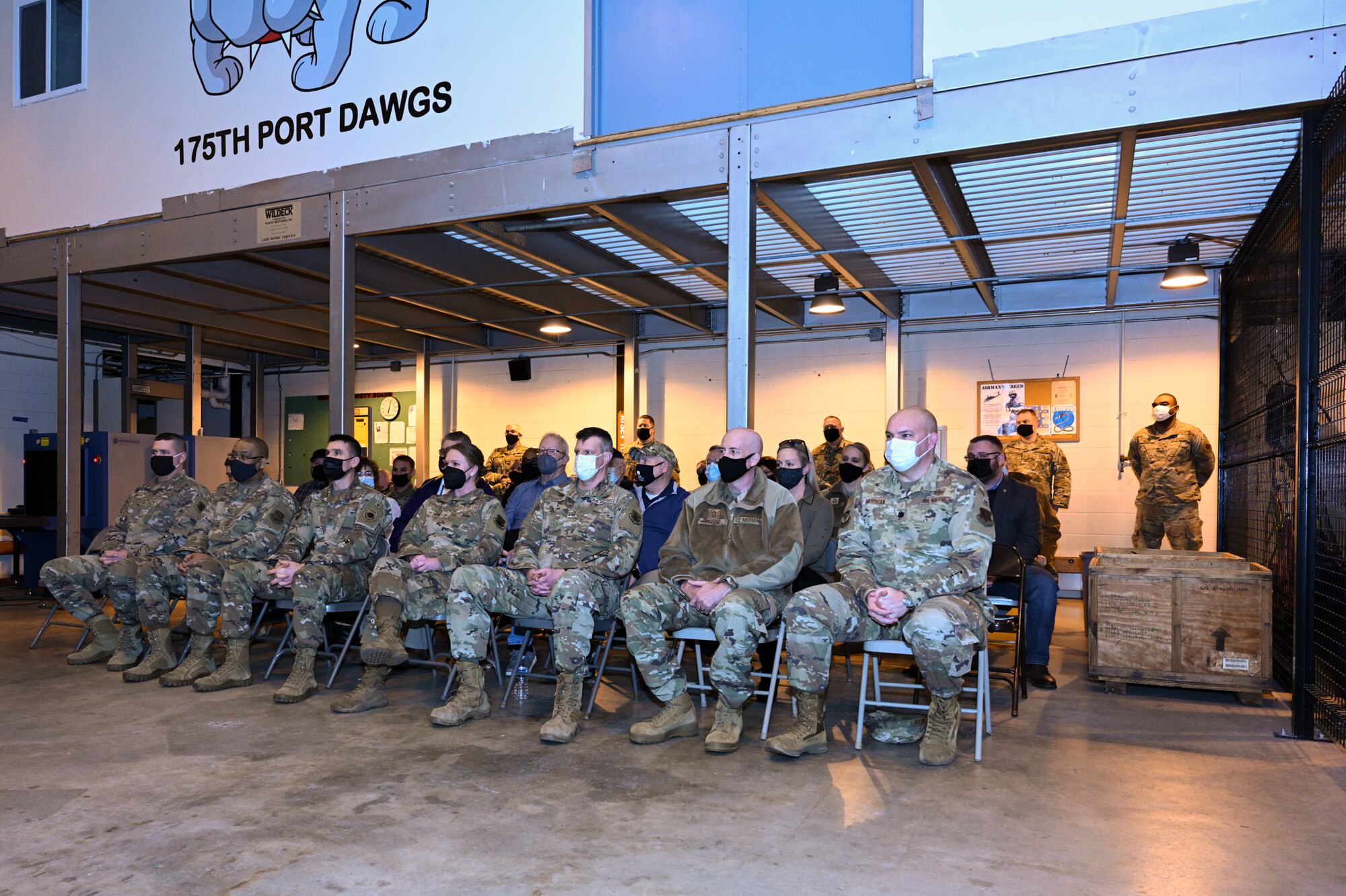 Members from the Maryland Air National Guard both active and retired, gathered to witness the deactivation of the Small Air Terminal Feb. 12, 2022, at Warfield Air National Guard Base, Middle River, Maryland. The 135th Aerial Port Flight was part of the Maryland Air National Guard from 1976, when it was activated at Martin State Airport, to 2008. Due to a decrease in personnel, the 135th APF transitioned to the Small Air Terminal, under the 175th Logistics Readiness Squadron. (U.S. Air National Guard photo by Senior Airman Danielle Lofton)