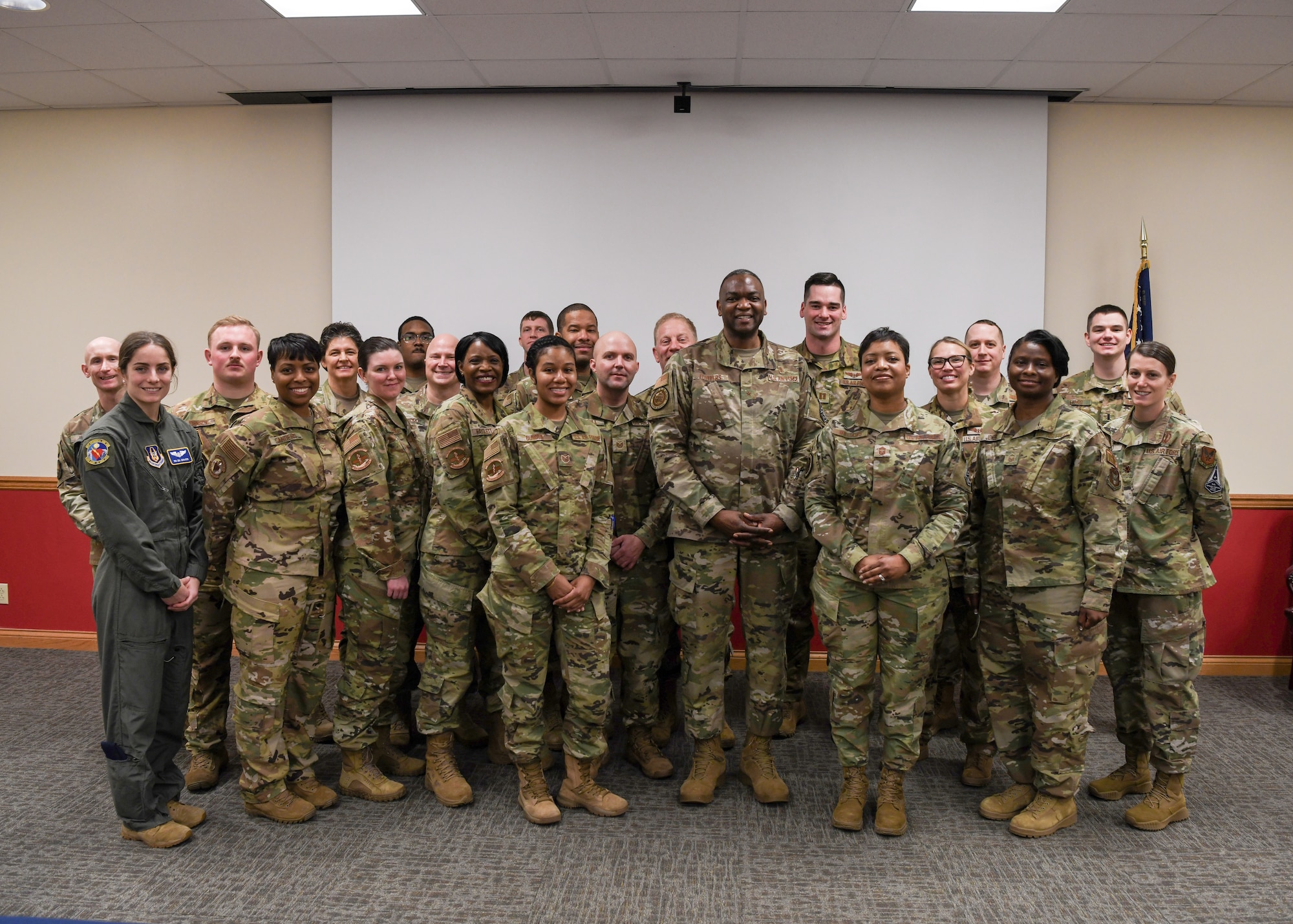 Brig. Gen. Alfred K. Flowers, Jr., Director of Manpower, Personnel and Resources, and Chief of the Medical Service Corps, Office of the Air Force Surgeon General and Chief Master Sgt. Kenya E. Williams, Chief, Manpower, Personnel, and Resources and Chief, Medical Enlisted Force Development, Office of the Air Force Surgeon General, visit with Reserve Citizen Airmen from the 445th Aerospace Medicine Squadron, 445th Aeromedical Staging Squadron and 445th Aeromedical Evacuation Squadron during their visit to Wright-Patterson Air Force Base, Ohio March 4, 2022.
