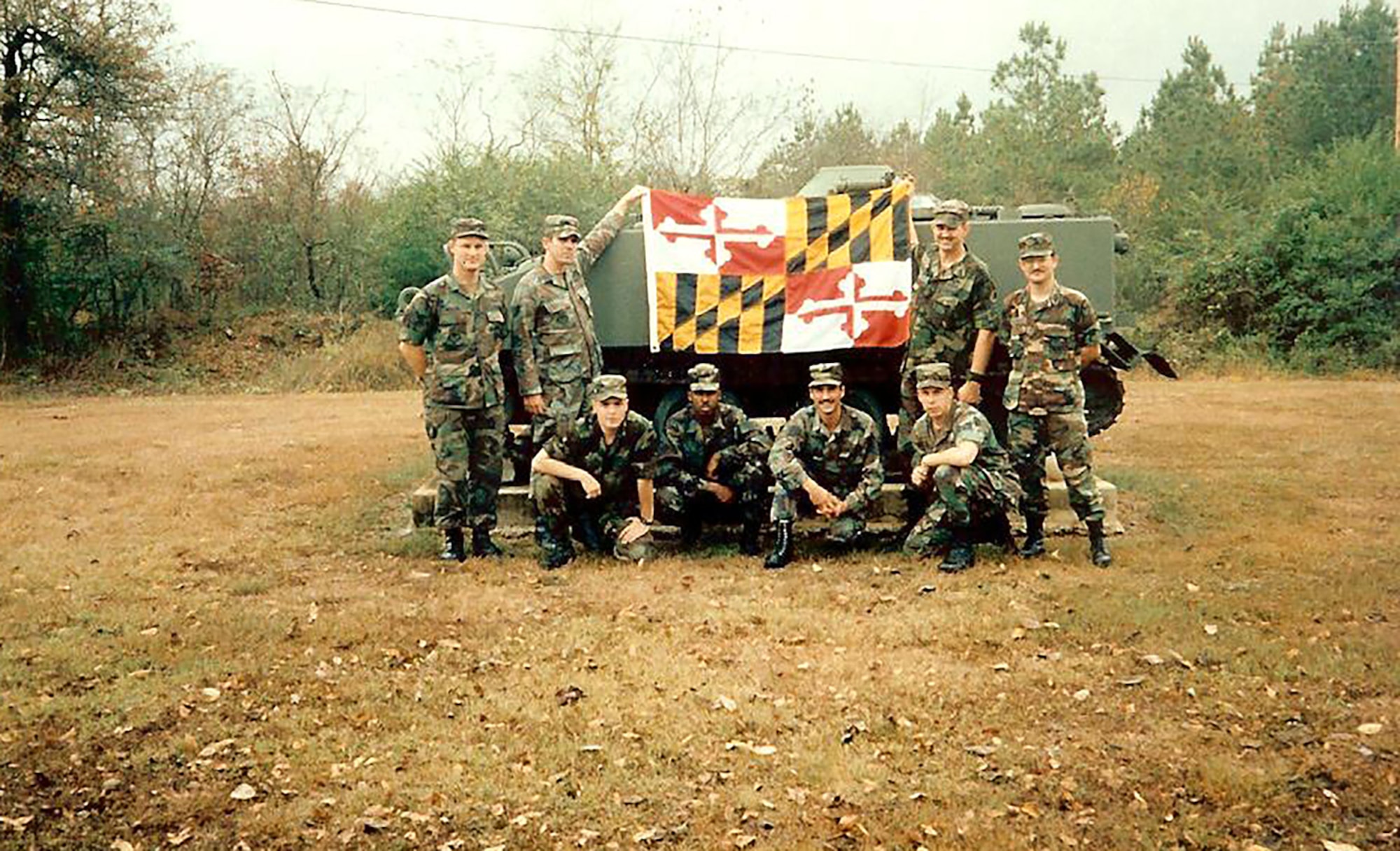 Members from the 135th Aerial Port Flight pose for a picture at the Volant Scorpion Air Base Defense School in 1991.