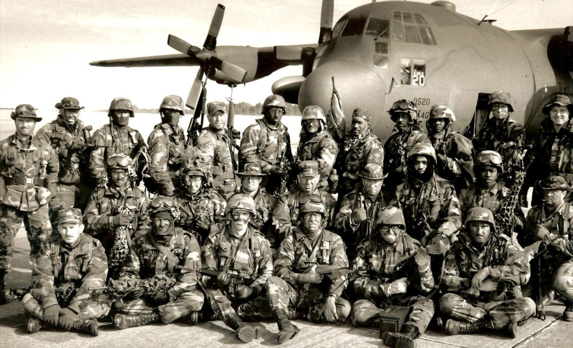 Members from the 135th Aerial Port Flight pose for a picture at the North Auxiliary Airfield in North, South Carolina in 1998.
