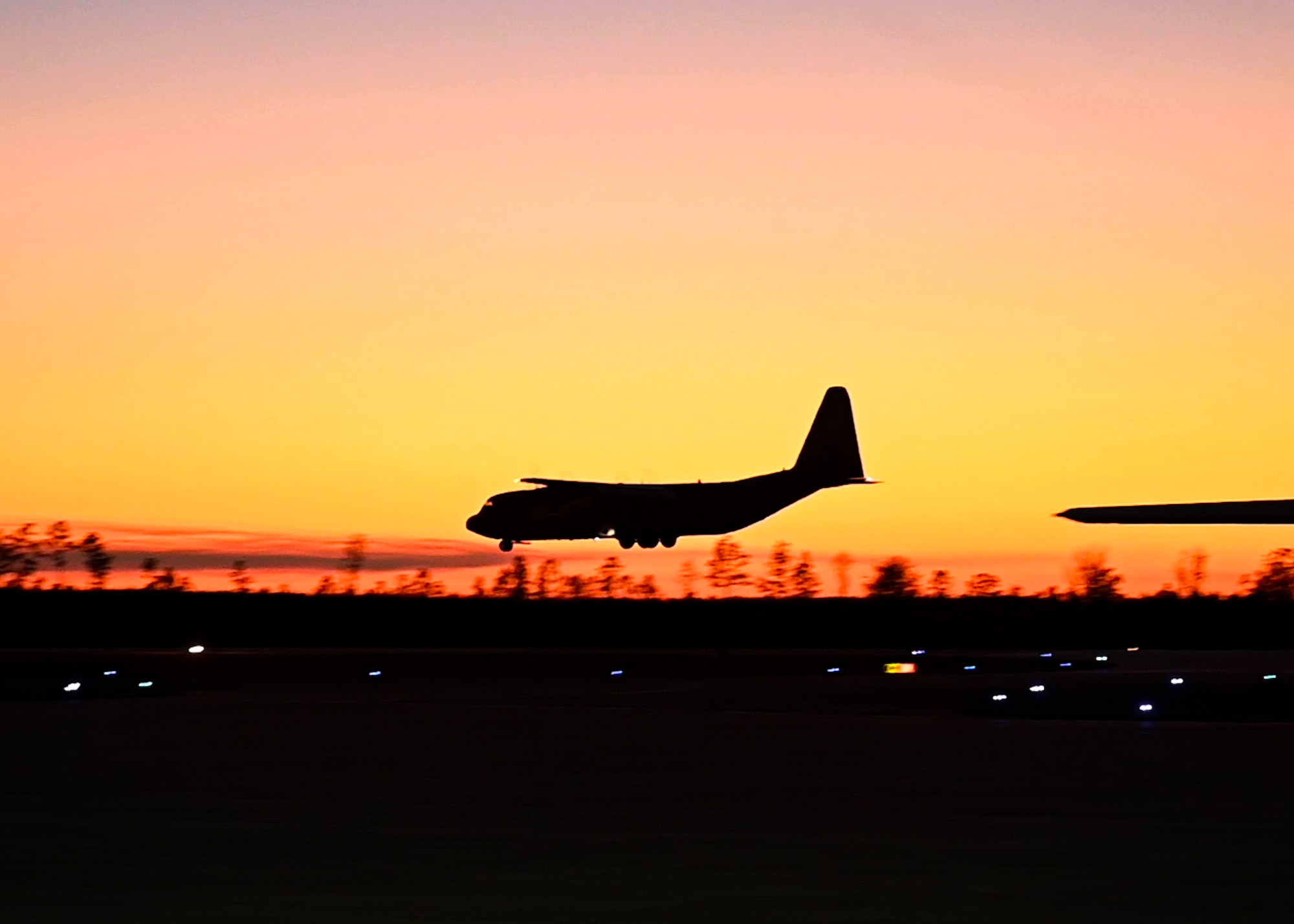 A C-130J Super Hercules from the 19th Airlift Wing lands at Stennis International Airport