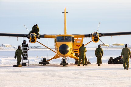 Members of the Royal Canadian Air Force 440th Transportation Division prep a CC-138 Twin Otter for flight in Prudhoe Bay, Alaska, before the U.S. Navy’s Ice Exercise (ICEX) 2022, Feb. 24, 2022.