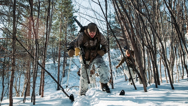 U.S. Marine Corps Pfc. Jafit Martinez, a native of Raleigh, North Carolina, and a rifleman with 3rd Battalion, 6th Marine Regiment, 2d Marine Division, II Marine Expeditionary Force, maneuvers on skis prior to Exercise Cold Response 2022, Setermoen, Norway, Feb. 23, 2022. Exercise Cold Response '22 is a biennial Norwegian national readiness and defense exercise that takes place across Norway, with participation from each of its military services, as well as from 26 additional North Atlantic Treaty Organization (NATO) allied nations and regional partners. (U.S. Marine Corps photo by Lance Cpl. Jacqueline C. Arre)