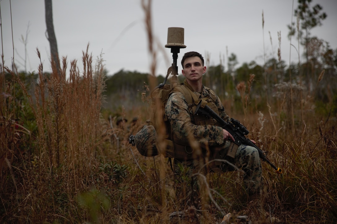 U.S. Marine Lance Cpl. Andrew Deeder with 2D Intelligence Battalion, II Marine Expeditionary Force Information Group (II MIG), operates the Communication Emitter Sensing and Attack System (CESAS) II Manpack during exercise Raven Odyssey on Camp Lejeune, North Carolina. Dec. 7, 2021. Raven Odysseys is a field exercise focused on maintaining infantry skills and integrating II MIG capabilities to train Marines in a dynamic, intelligence driven, environment. (U.S. Marine Lance Cpl Elijah. D. Hurtado)