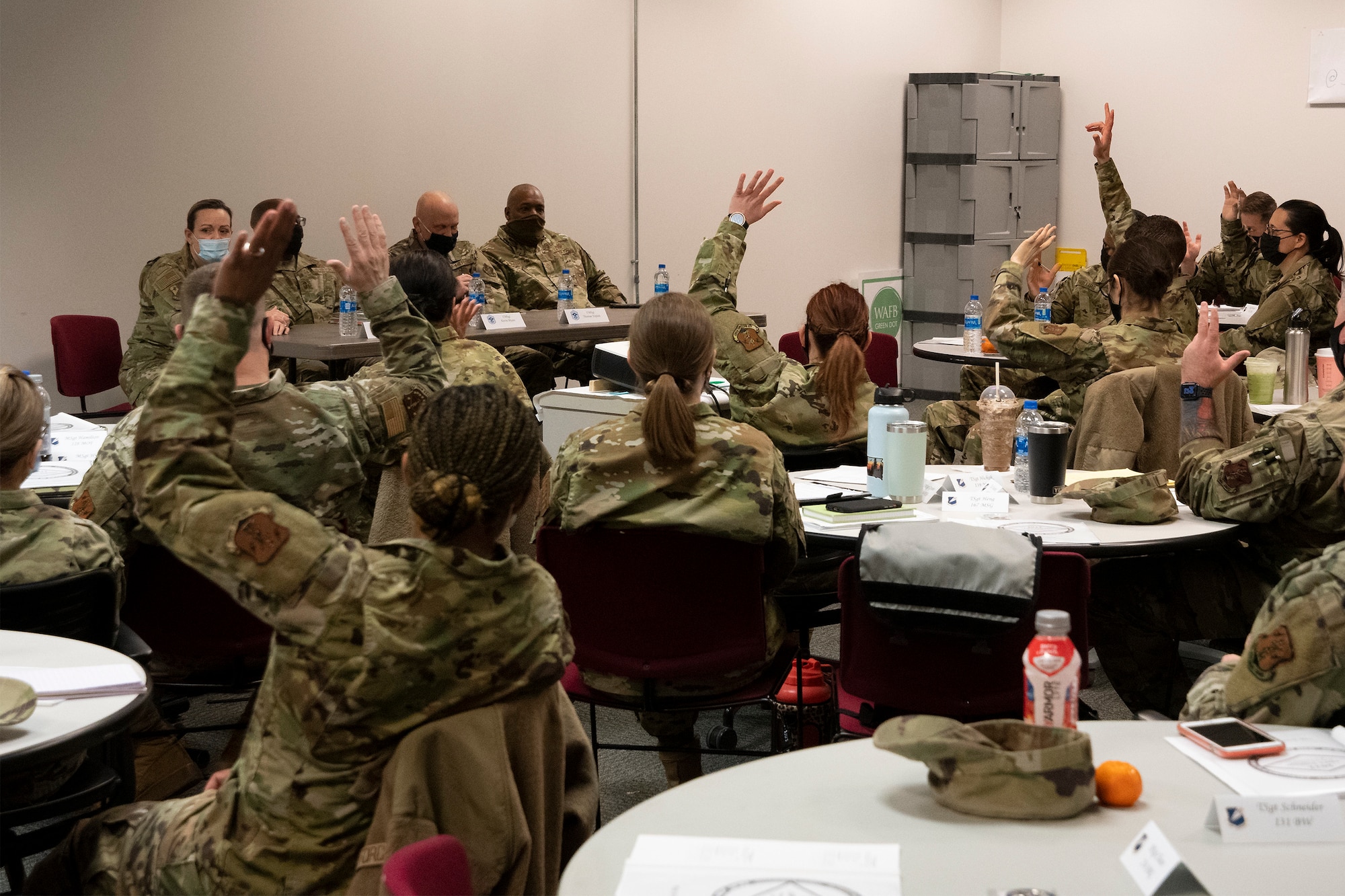 U.S. Air National Guard members respond to a query during the Additional Duty First Sergeant Seminar at Whiteman Air Force Base, Missouri, Feb. 8, 2022. Noncommissioned officers from 17 different states took part in the seminar to learn about and understand the roles and responsibilities of additional duty first sergeants. (U.S. Air National Guard photo by Airman 1st Class Kelly C. Ferguson)