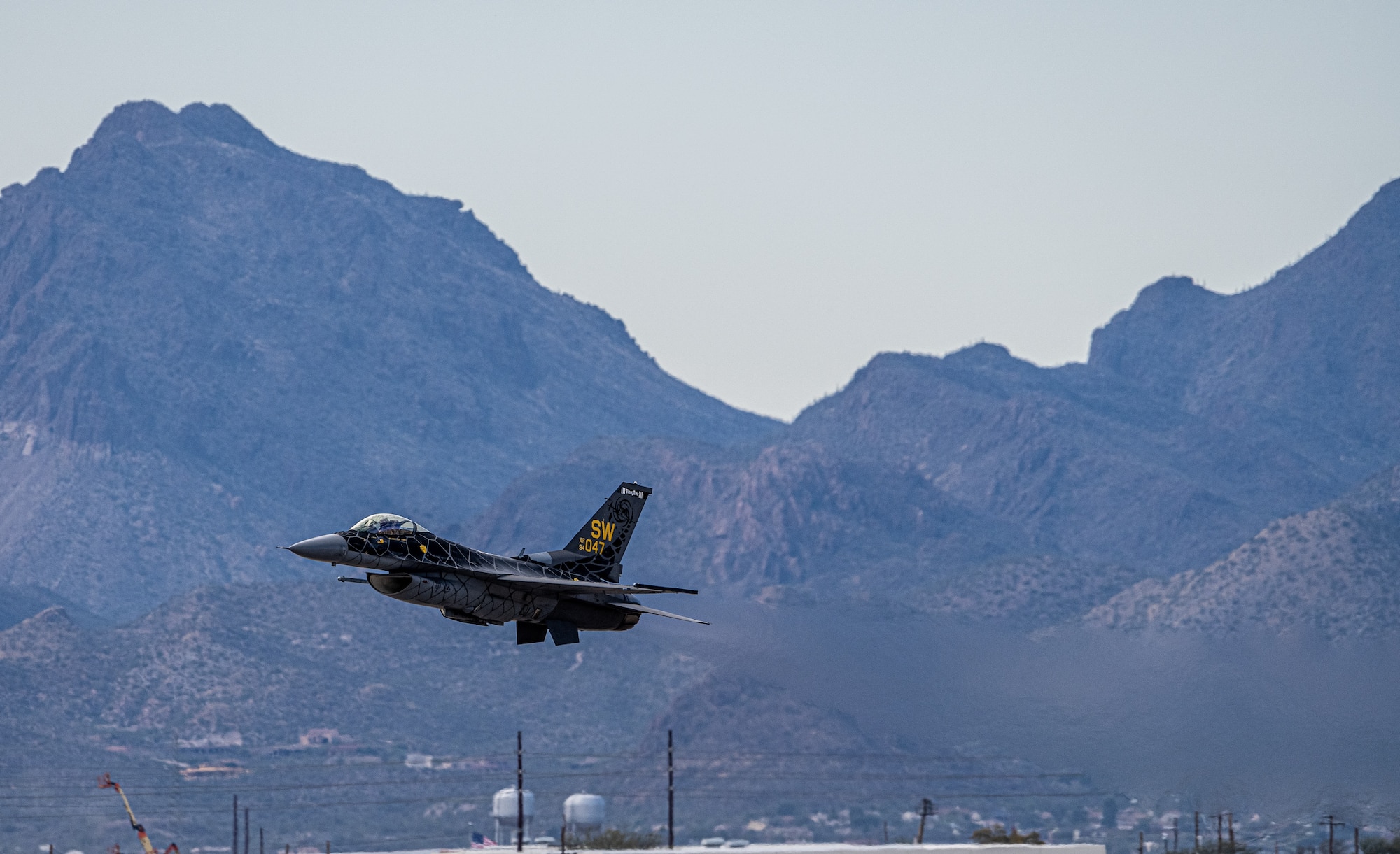 A picture of an F-16 taking off at Davis Monthan Air Force Base.
