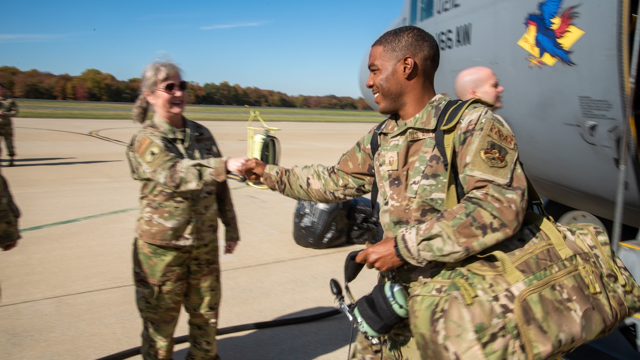 Airmen departing a C-130