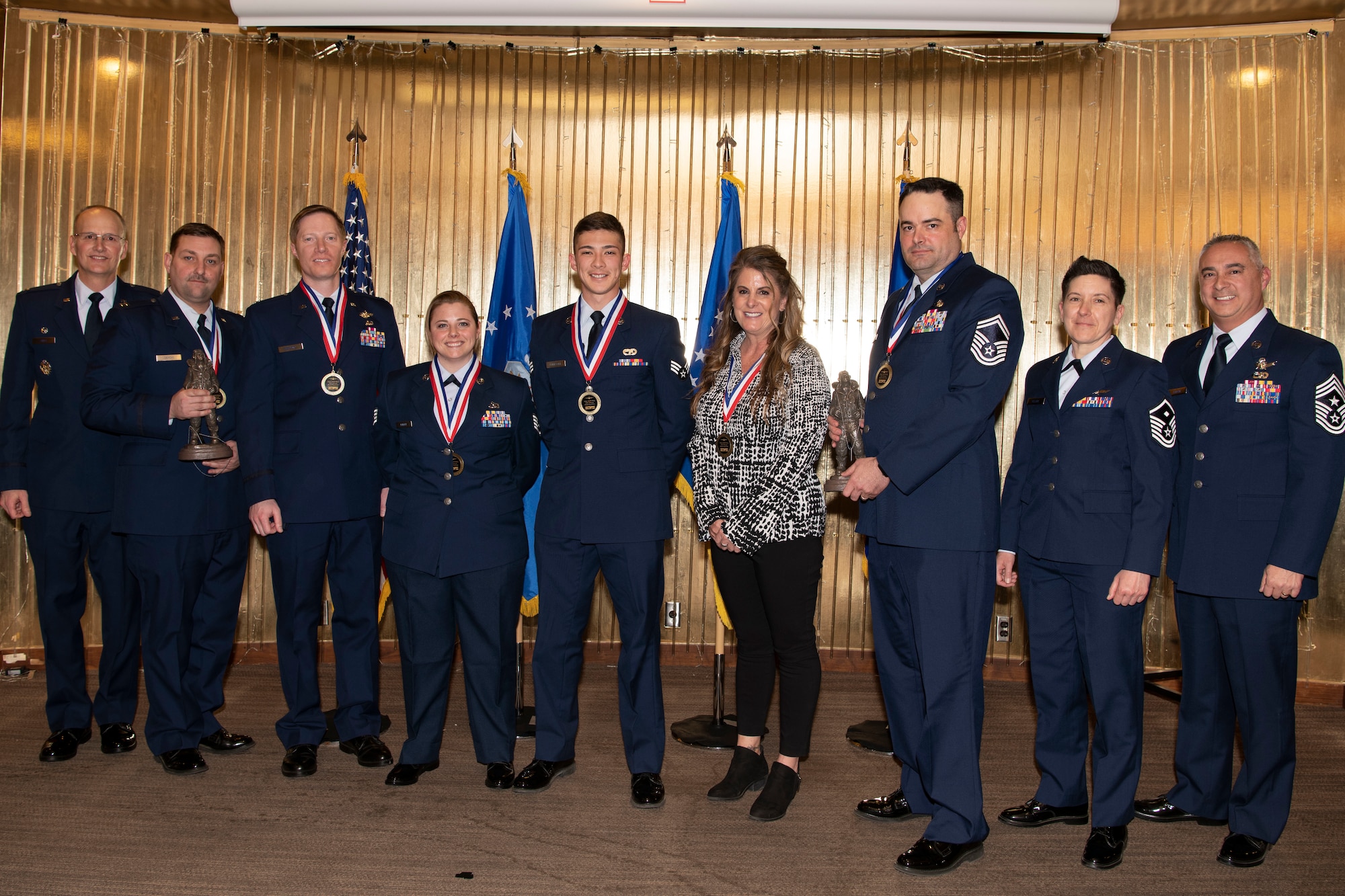 The 302nd Airlift Wing 2021 Annual Award winners pose for a photo during the 302nd Airlift Wing Annual Awards Ceremony at Peterson Space Force Base, Colorado, March 5, 2022.