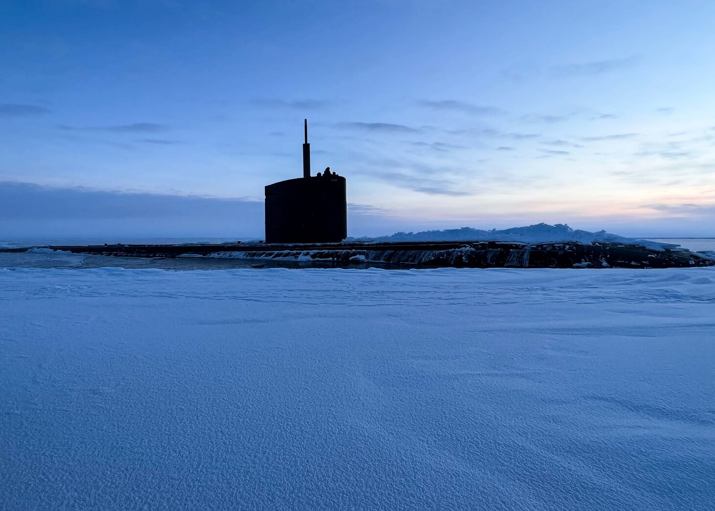 Los Angeles-class fast-attack submarine USS Pasadena (SSN 752) surfaces in the Beaufort Sea March 5, 2022, kicking off Ice Exercise (ICEX) 2022.