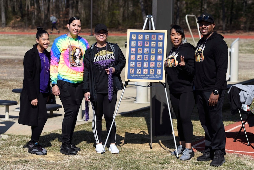 Joint Base Andrews Women’s History Month committee members pose for a group photo at Joint Base Andrews, Md., March 5, 2022.