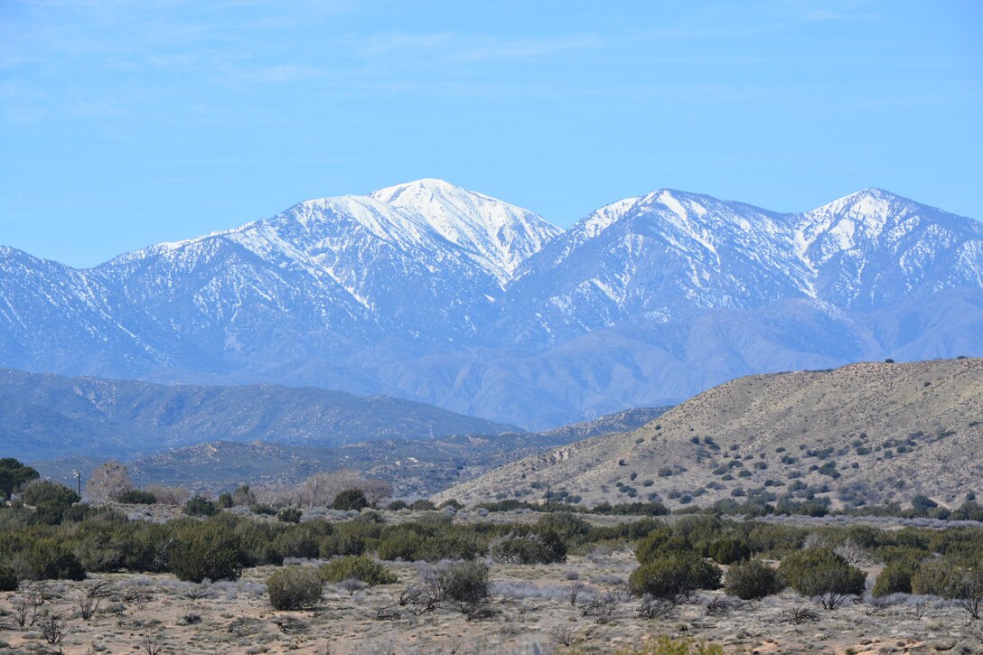 The snow-covered San Bernardino Mountains contrast with the Mojave Desert landscape March 2 near the Mojave River Dam in San Bernardino County, California.