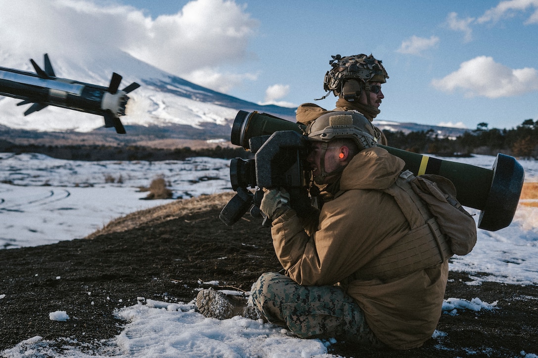 U.S. Marines with 1st Battalion, 3d Marines, 3d Marine Division fire a Javelin shoulder-fired anti-tank missile while conducting squad attacks during Fuji Viper 22.3 at Combined Arms Training Center, Camp Fuji, Japan, Feb. 17, 2022. During this exercise Marines sharpened critical combined arms skills, ensuring they are ready and capable to execute a wide range of missions anywhere in the world. 1/3 is forward-deployed in the Indo-Pacific under 4th Marines as a part of the Unit Deployment Program. (U.S. Marine Corps photo by Cpl. Juan Carpanzano)