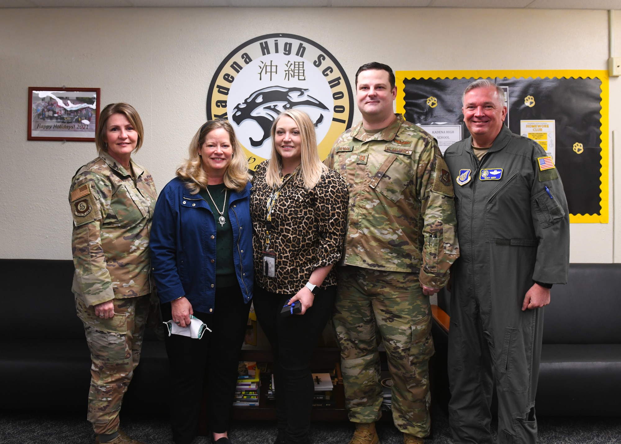 Lt. Gen. Ricky Rupp poses for a group photo with Leanne Oatman, D.o.D. Education Activity staff member.
