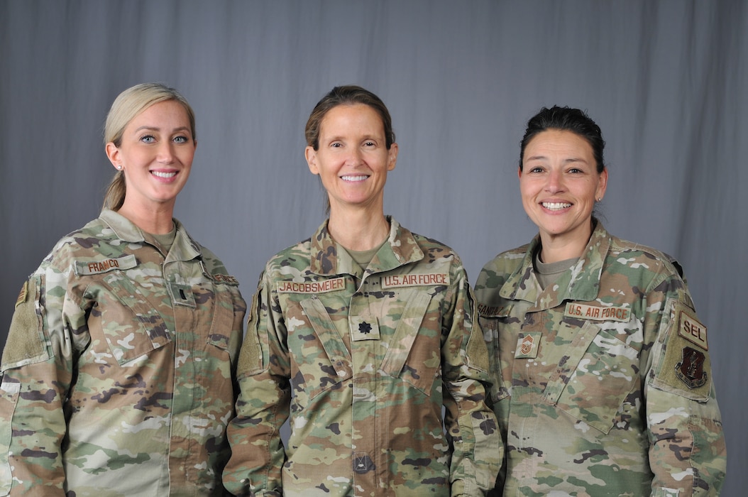 Image of Airmen posing for a photo.