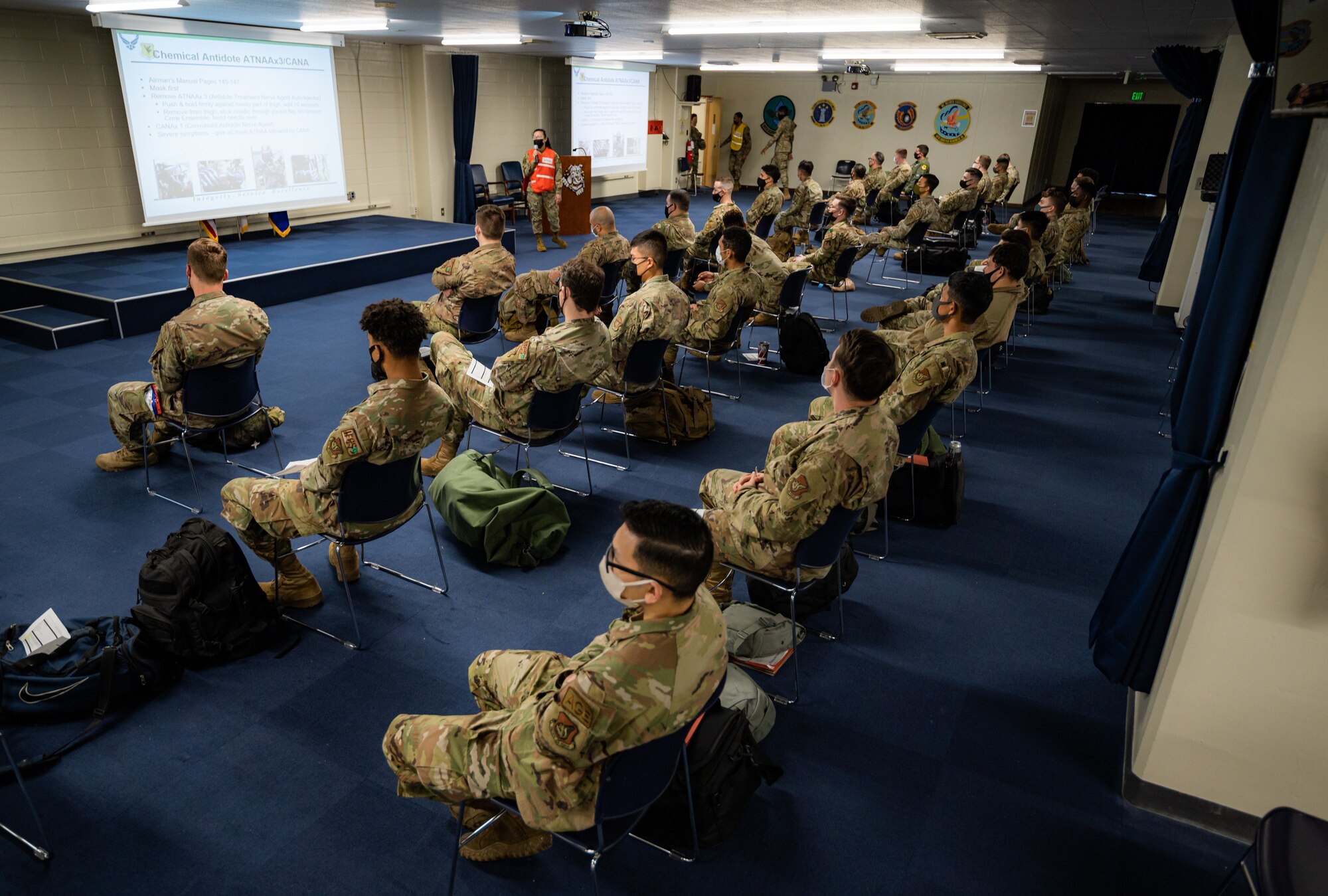 Airmen listen to briefing.