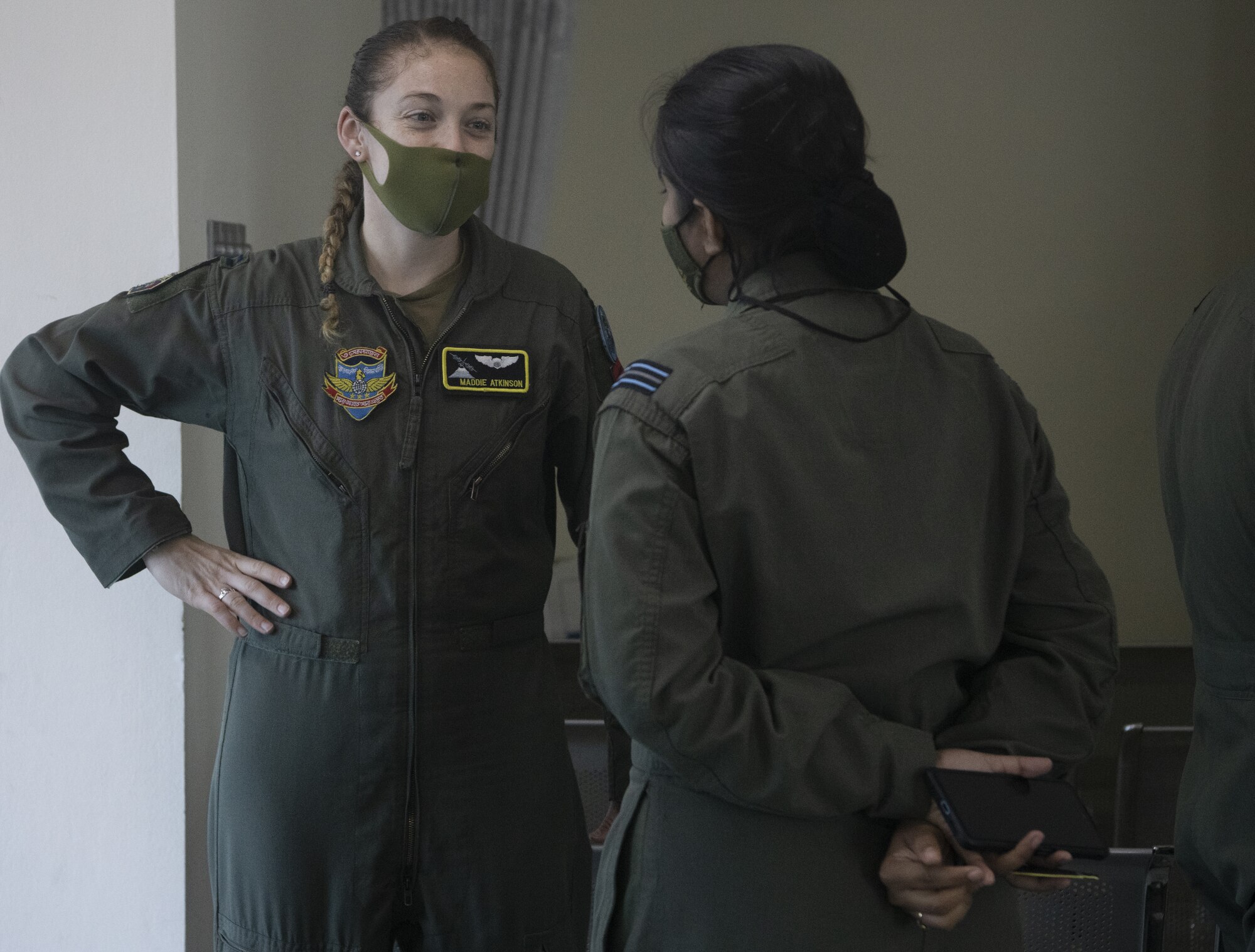 U.S. Air Force Capt. Madeline Atkinson, 36th Expeditionary Airlift Squadron mission commander, has a conversation with Bangladesh air force (BAF) Flight Lieutenant Israt Drishty, prior to an air drop training mission during Exercise Cope South 2022, Feb. 20, 2022, at BAF Base Bangabandhu, Bangladesh. Airmen assigned to the 36th EAS work side-by-side with BAF pilots and maintainers to perform training tasks and evaluate proficiency during the exercise. Exercise Cope South provides an opportunity for Pacific Air Forces and the Bangladesh armed forces to strengthen their relationship and enhance interoperability, to operate more effectively together when needed.