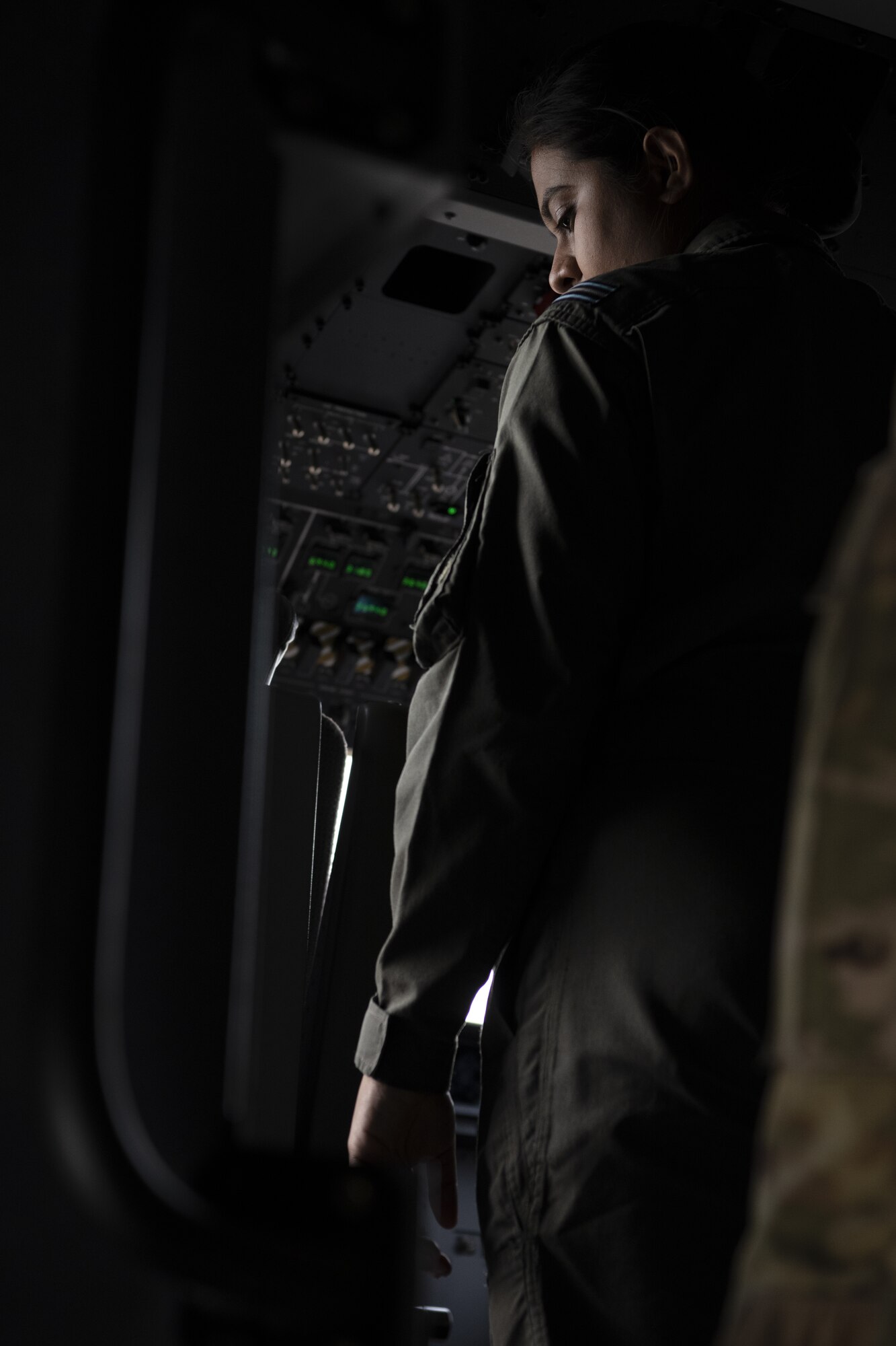 Bangladesh air force (BAF) Flight Lieutenant Israt Drishty, C-130 Hercules pilot, observes U.S. Air Force C-130J Super Hercules pilots assigned to the 36th Expeditionary Airlift Squadron, prior to take-off to support an air drop training mission during Exercise Cope South 2022, Feb. 20, 2022, at BAF Base Bangabandhu, Bangladesh. Airmen assigned to the 36th EAS work side-by-side with BAF pilots and maintainers to perform training tasks and evaluate proficiency during the exercise. During Exercise Cope South, U.S. and Bangladesh air forces exchange airlift, air-land and airdrop delivery techniques, to enhance their collective ability to respond to regional disasters.