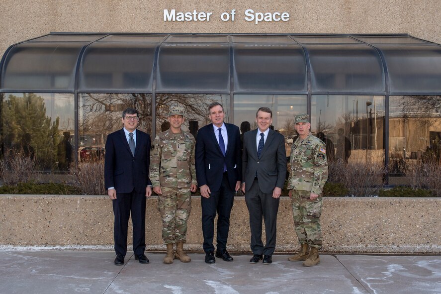Military and Congressional members meet to discuss protect and defend mission.