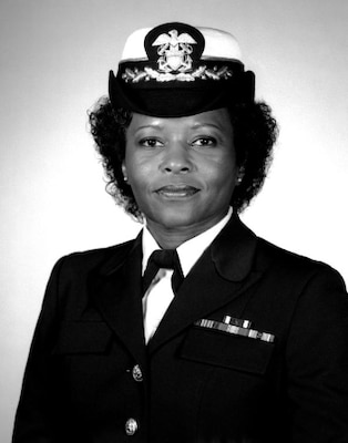 Official black white portrait of woman in her uniform