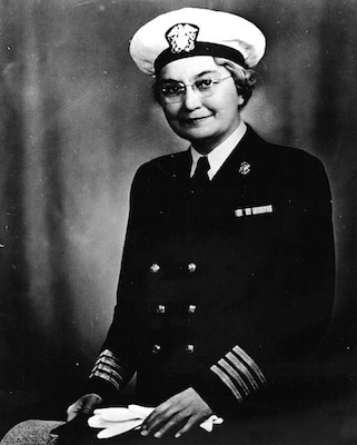 Black and white portrait of woman in her uniform
