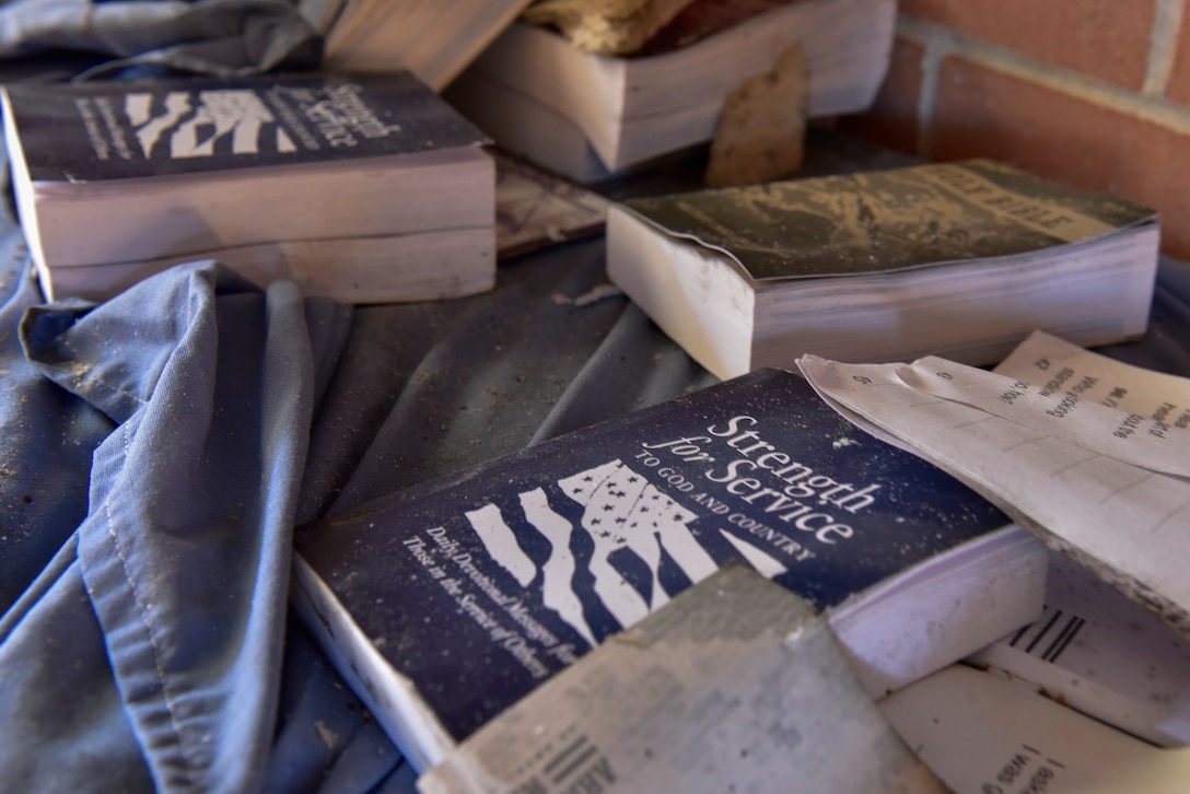 A stack of service books still sit at the front of the main base chapel before the entire facility undergoes demolition at Tyndall Air Force Base, Fla., Feb. 11, 2019.