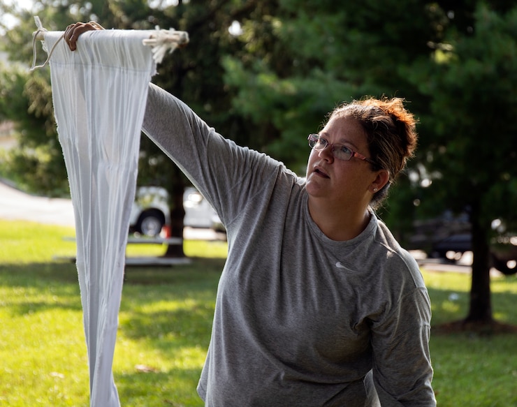 Dr. Yvonne-Marie Linton, Research Director, The Walter Reed Biosystematics Unit, shows how to use a tick drag tool July 16, 2021.