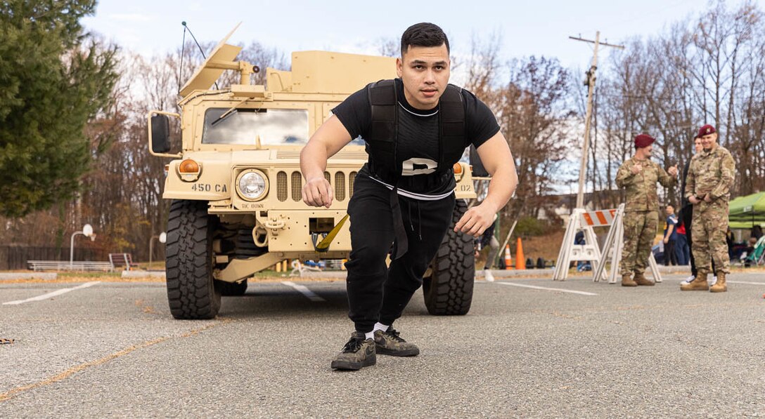 A soldier with the Walter Reed Army Institute of Research (WRAIR), competes in the Humvee Pull event as part of the Strongman/Woman competition on December 03, 2021 in Silver Spring, MD.