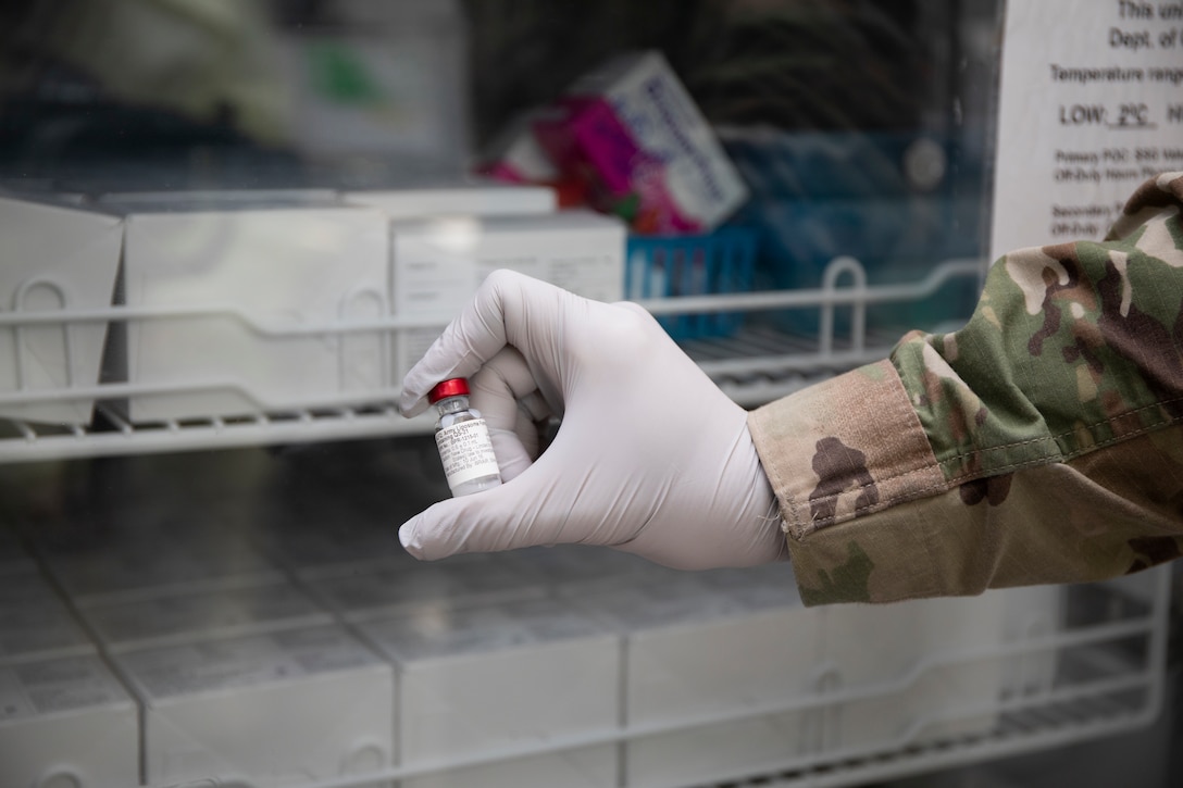 A vial of Army liposome formulation Q (ALF Q) is stored during the start of phase I clinical trials for WRAIR's COVID-19 vaccine, spike ferritin nanoparticle (SpFN) vaccine.