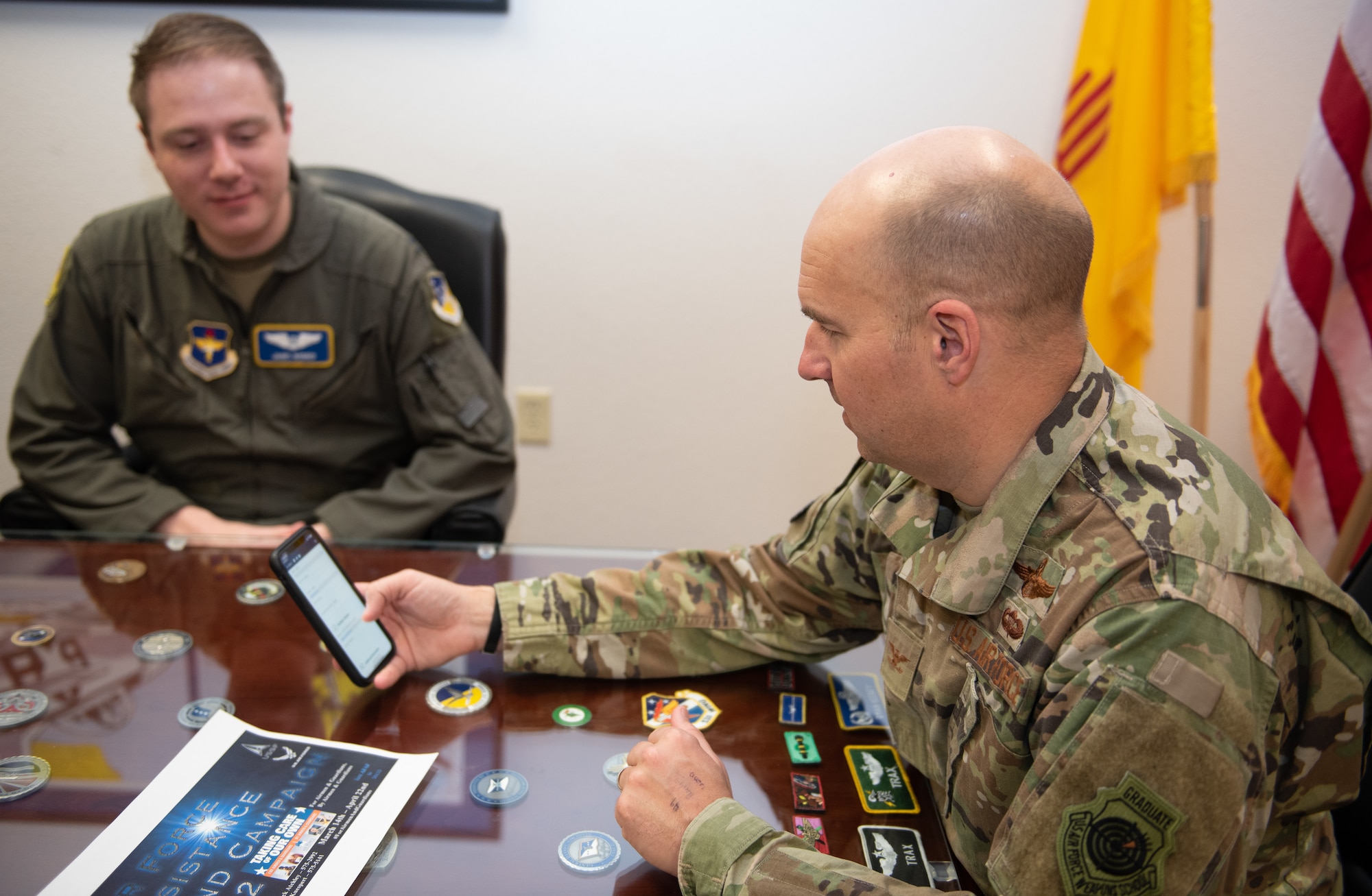 Col. Ryan Keeney learns to virtually donate to the Air Force Assistance Fund.