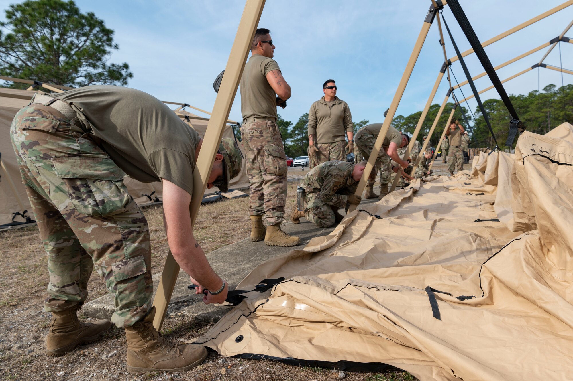 Mission Sustainment Team members build a military shelter system during a MST training March 3, 2022, at Hurlburt Field, Florida.