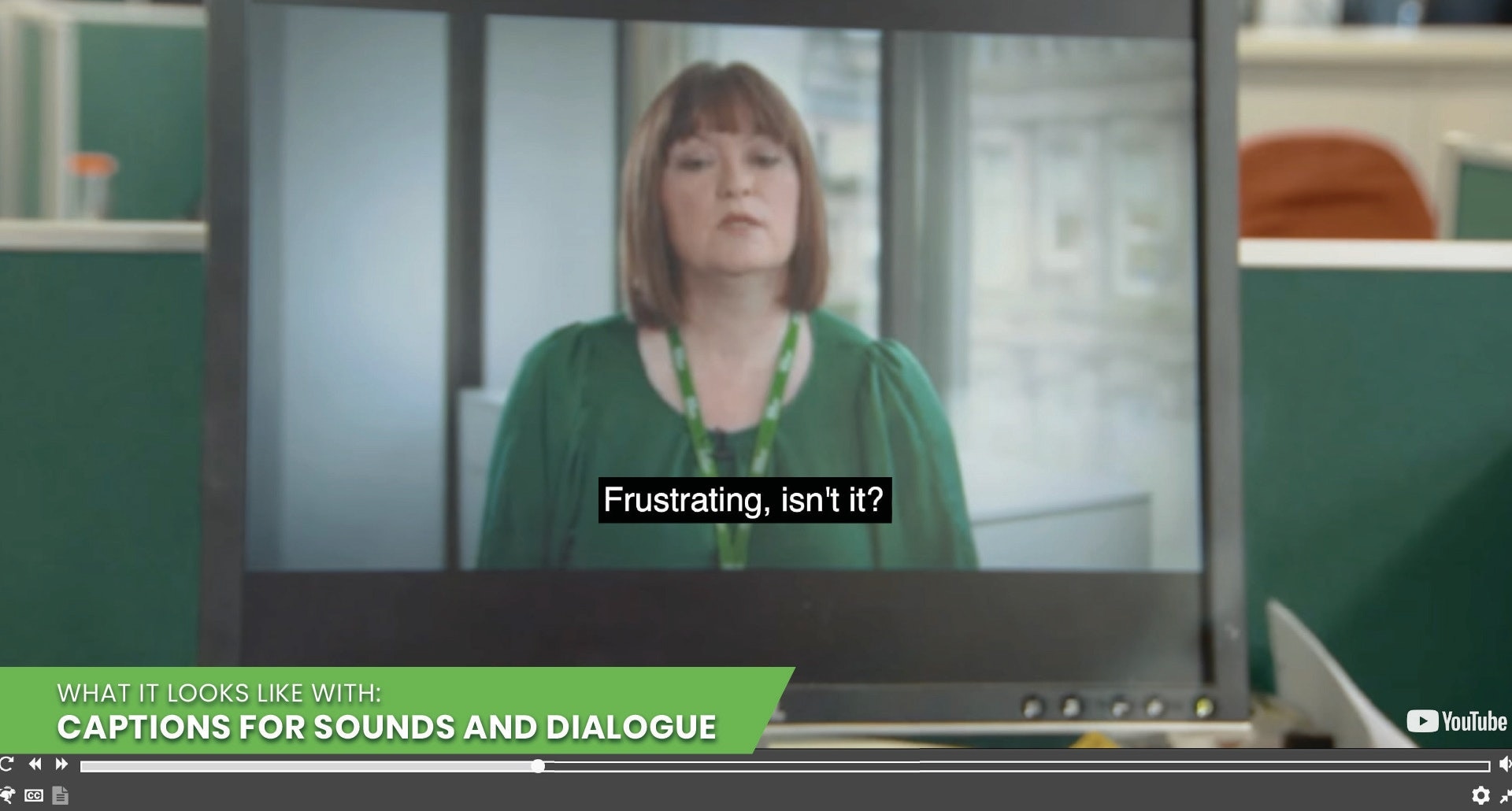 Image of a video playing on a computer with captions for dialogue and sound turned on.