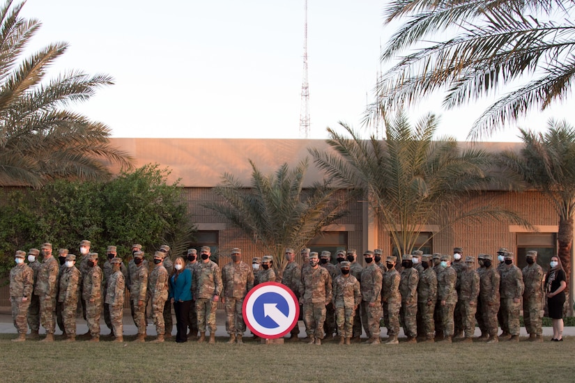 Soldiers stand at Camp Arifjan, Kuwait