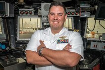 220307-N-OC333-1010 MANAMA, Bahrain (March 7, 2022) Lt. Cmdr. Matthew J. Intoccia, commanding officer of USS Tempest (PC 2), poses for a photo, March 7. Tempest decommissioned during a ceremony at Naval Support Activity Bahrain, marking the end of 29 years of U.S. Navy service.