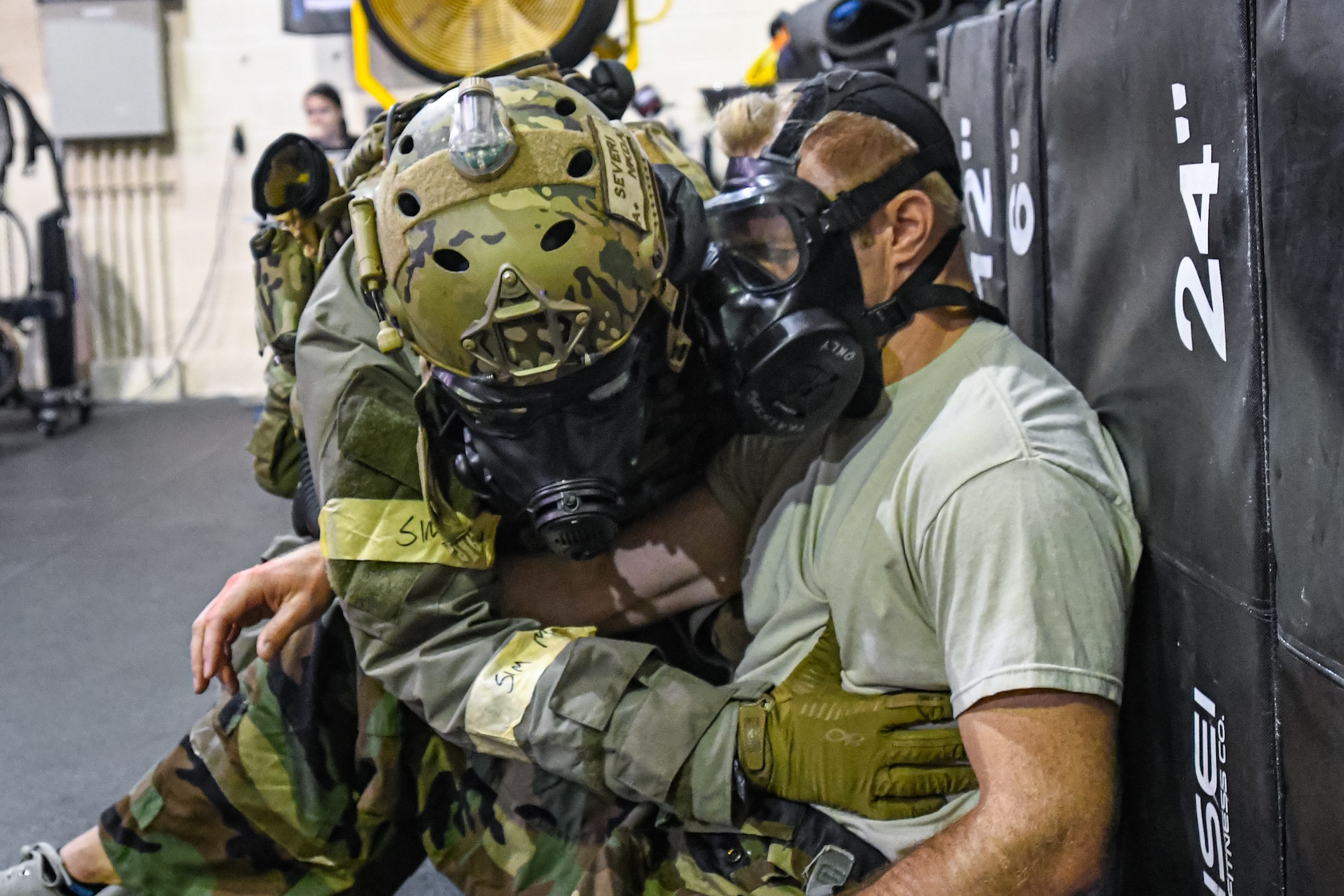 Photo of operator assisting patient.