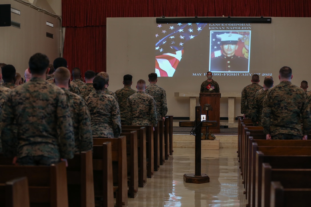 U.S. Marines with 9th Engineer Support Battalion, 3rd Marine Logistics Group, attend a memorial ceremony commemorating the life of Lance Cpl. Kenan Napoleon, an engineer equipment operator with 9th ESB,  Camp Hansen, Okinawa, Japan, Feb. 17, 2022. Napoleon enlisted into the Marine Corps out of Fairbanks, Alaska and reported to Okinawa, Japan in late 2019. (U.S. Marine Corps photo by Lance Cpl. Sydni Jessee)