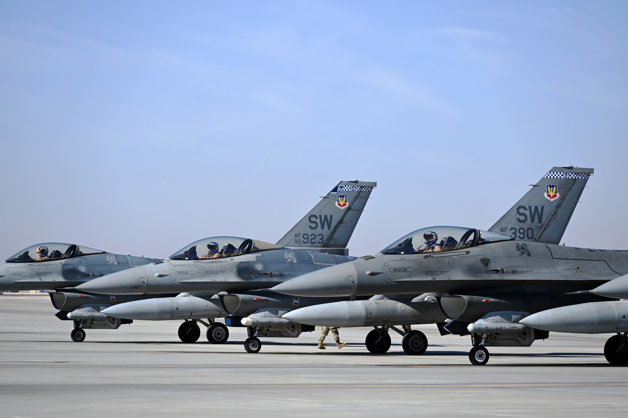 Four 332d Air Expeditionary Wing F-16 Fighting Falcon aircraft wait for armament prior to takeoff in Southwest Asia, Feb. 8, 2022.