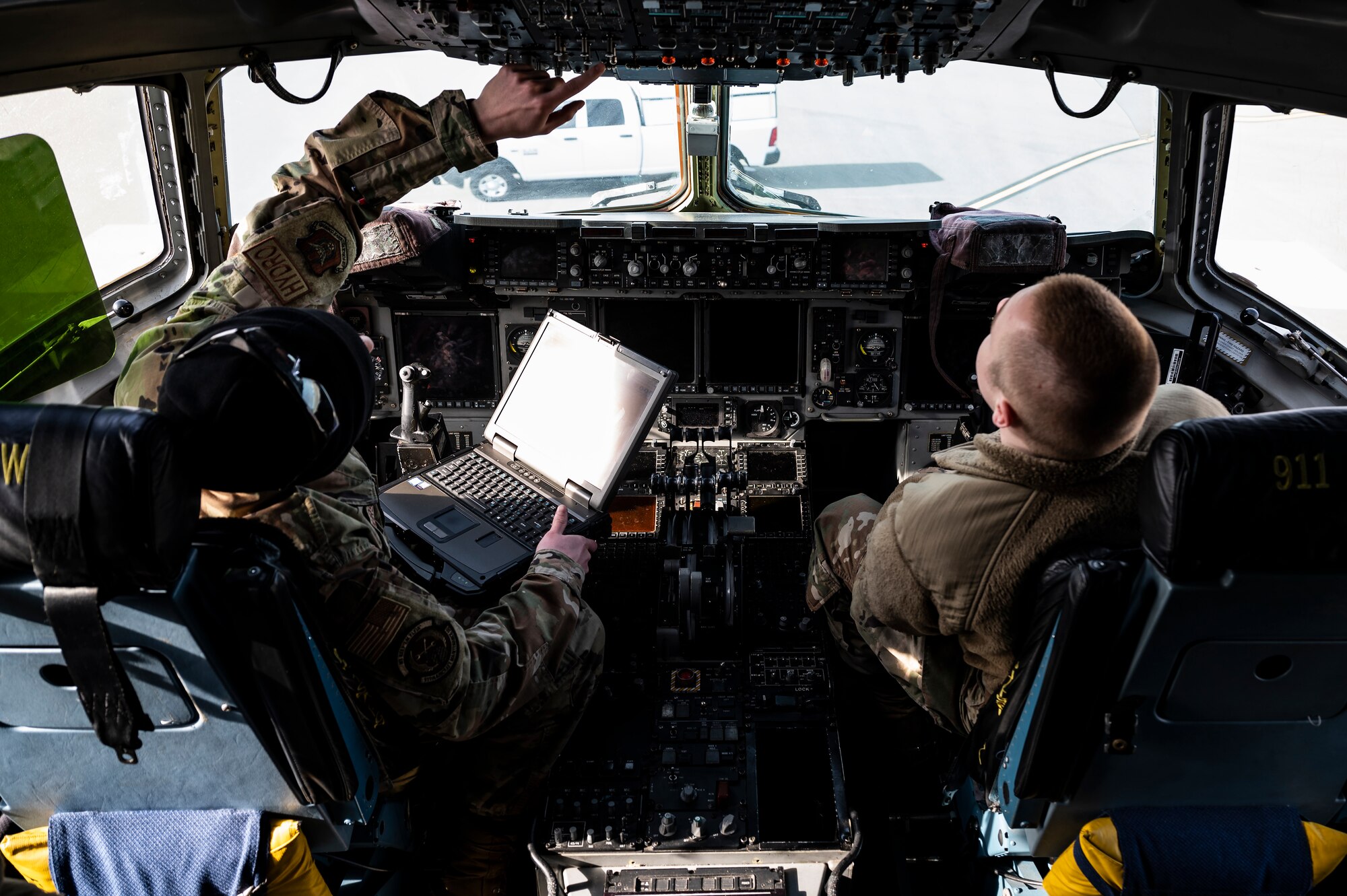 Airman 1st Class Ethan Dursi and SrA Dominico Spinello, 911th Aircraft Maintenance Squadron hydraulics technicians, conducts power up procedures on a C-17 Globemaster III during a pre-flight inspection at the Pittsburgh International Airport Air Reserve Station, Pennsylvania, March 1, 2022.