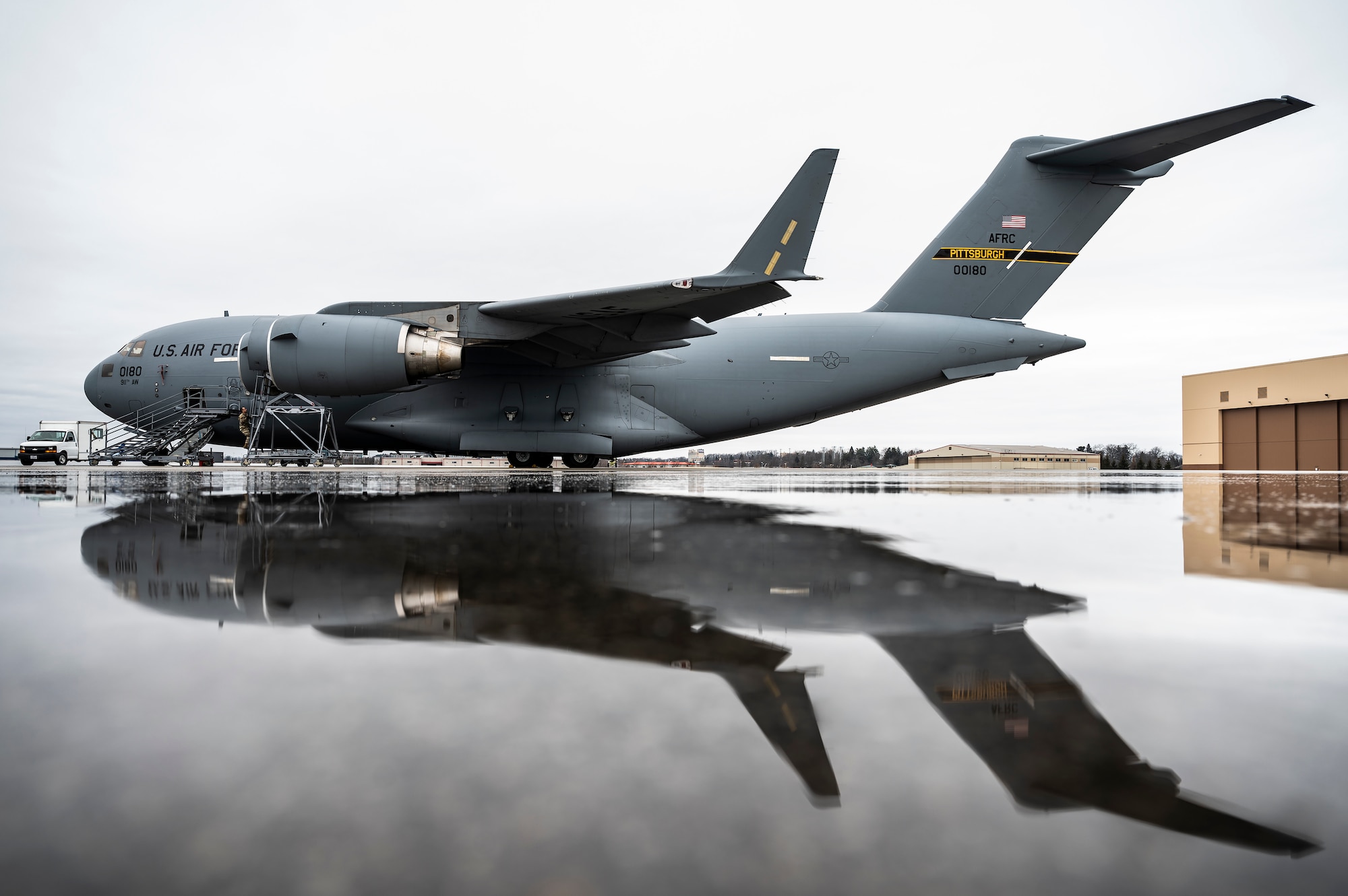 A C-17 Globemaster III assigned to the 911th Airlift wing sits on the flight line while receiving engine maintenance at the Pittsburgh International Airport Air Reserve Station, Pennsylvania, Feb. 22, 2022.