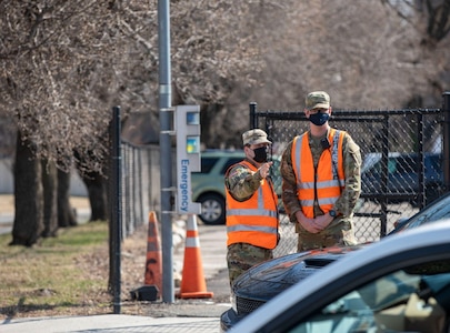 Vermont Army National Guard Soldiers provide assistance at a U.S. Capitol Police (USCP) designated traffic control point in Washington, D.C., March 5, 2022. The National Guard has been activated to assist the District of Columbia Metropolitan Police Department and USCP with traffic control in anticipation of First Amendment demonstrations in the city. (U.S. Army National Guard photo by Sgt. Denis Nunez)