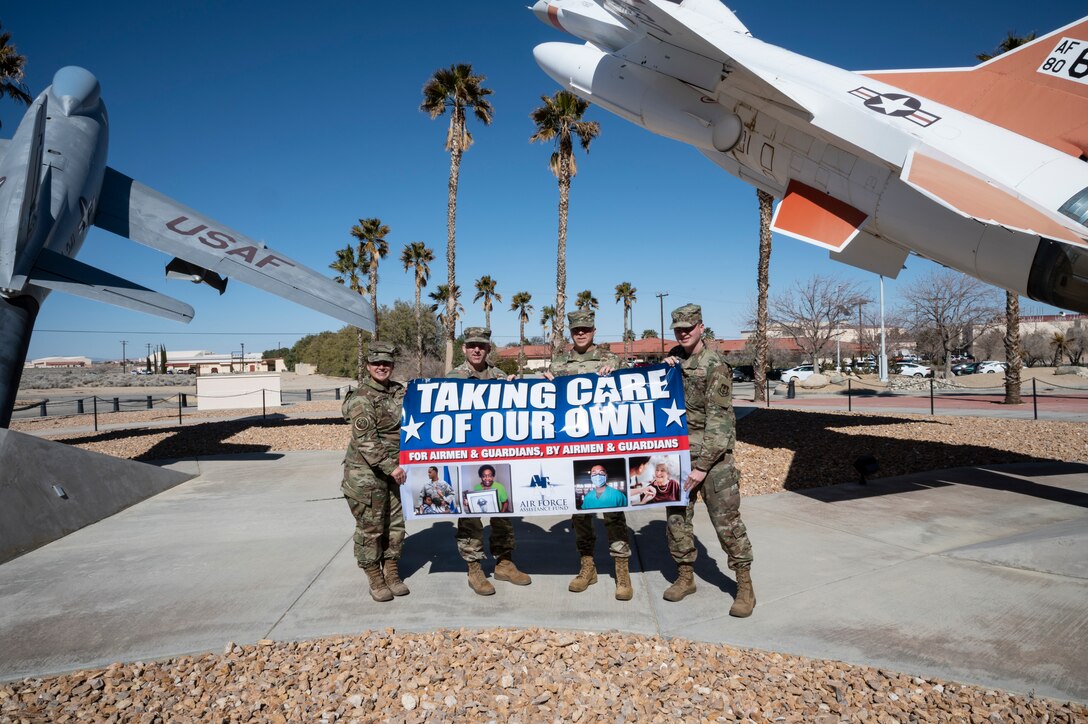 Brig. Gen. Matthew Higer, 412th Test Wing Commander, helps kick off the Air Force Assistance Fund Campaign at Edwards Air Force Base, California, March 7. (Air Force Photo by Adam Bowles).