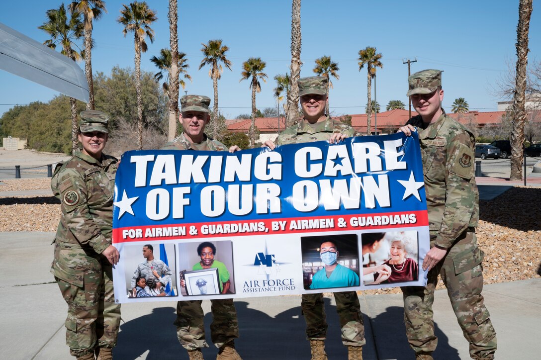 Brig. Gen. Matthew Higer, 412th Test Wing Commander, helps kick off the Air Force Assistance Fund Campaign at Edwards Air Force Base, California, March 7. (Air Force Photo by Adam Bowles).