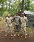North Macedonian army Maj. Zoran Milenkoski and Maj.Ljupco Karanfilovski pose for a photo with U.S. Army National Guard Capt. Mark Bowen (center) at Fort Drum, N.Y., Aug. 13, 2013. The 86th IBCT is participating in an Exportable Combat Training Center rotation in preparation for Joint Readiness Training Center rotation in 2014. (U.S. Air National Guard photo by Airman Jeffrey Tatro)