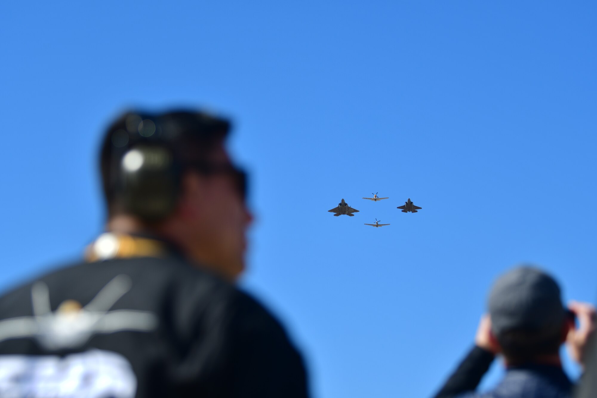 Four planes flying in formation.